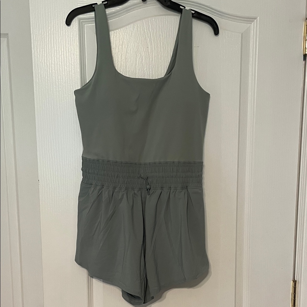 Yogalicious Sleeveless Romper in color “tourmaline”